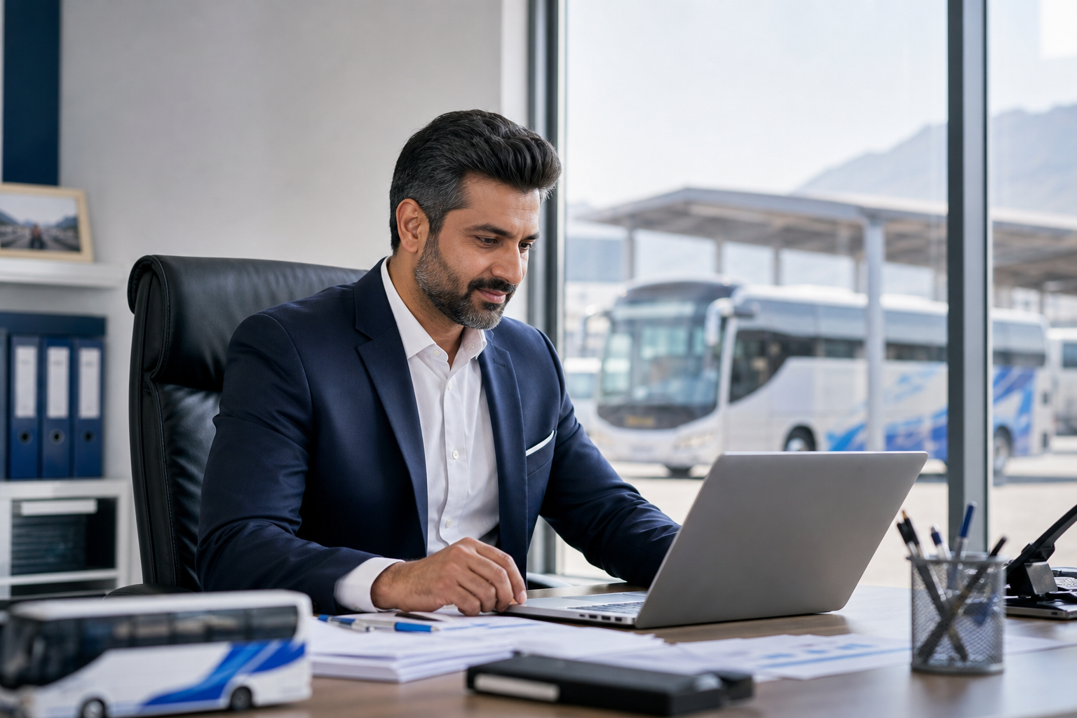Transport business owner reviewing operational performance